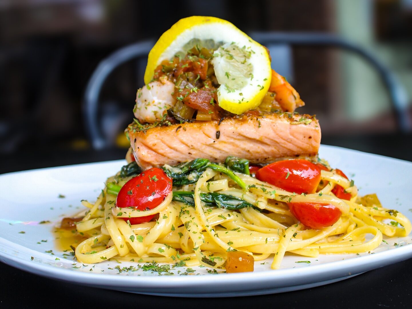 Salmon and pasta dinner menu item helps to convey the type of food served at Sanctuary on the Square restaurant in downtown Gainesville, GA
